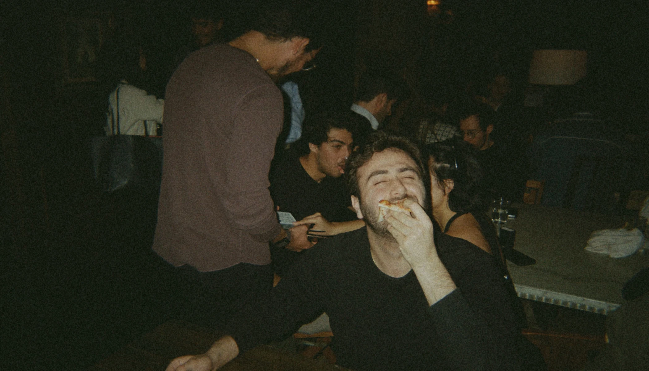 People with drinks and backgammon boards
